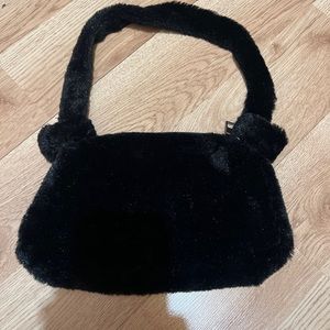 black fluffy purse
